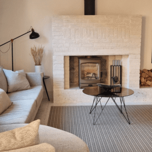 Earthborn's Fllutterby claypaint on living room walls and fireplace